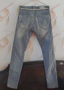 Distressed Gray Denim Jeans