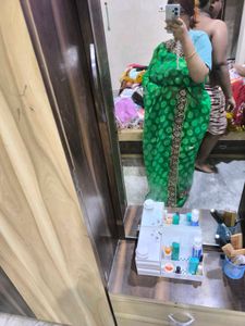 Green Leaf Saree With Yellow Stones.