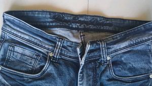 Distressed Denim Jeans