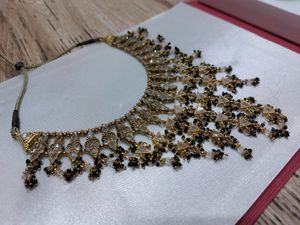 Golden And Black Necklace