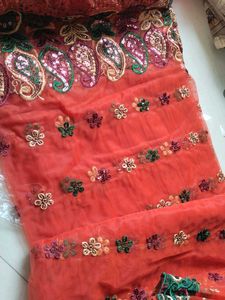 Orange Coral Net Saree With Green Border