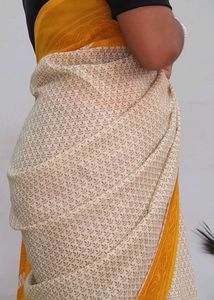 Elegant Cream & Yellow Saree