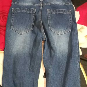 Distressed Blue Denim Jeans