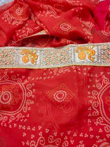very pretty bandhani orange saree