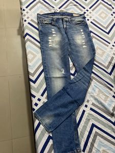 Distressed Denim Jeans
