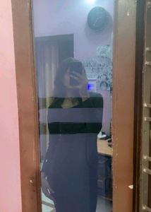 a black full sleeve bodycon dress