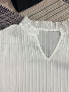 Elegant White Pleated Top - new and never wore