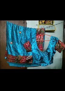 Badhni silk saree and blouse.