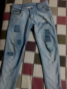 Patched Denim Jeans