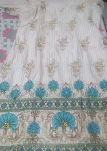 Elegant Embroidered Kurta in firozi colour