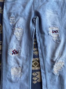 Distressed Denim Jeans