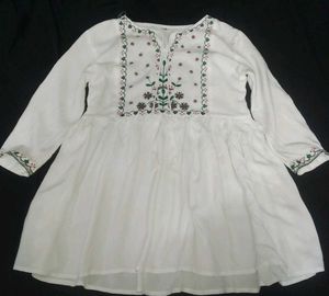White Embroidered Peplum Top