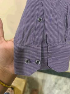 Purple Shirt With White Straps From Van Heusen.