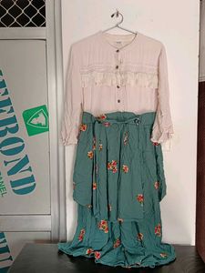 This Is A Flared Dress With Lily Print On It