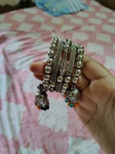 Silver tone bracelet and earrings