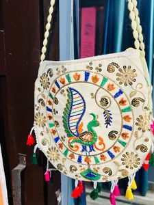 Peacock Charm Embroidered Sling