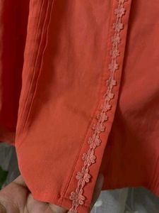 Coral Ruffle Blouse