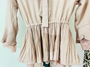 Cute Peach Peplum Top with Bow