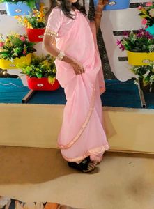Elegant Pink Saree with Gold Border