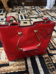Red Handbag with Floral Detail