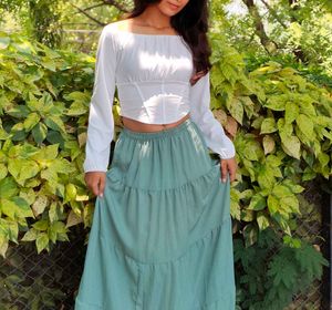 White Corset Top And Green Maxi Skirt