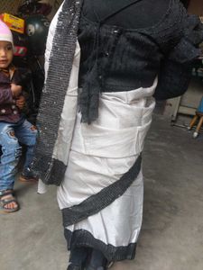 Elegant Silver Saree with Black Border