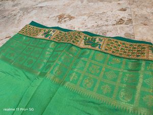 Elegant Green Silk Saree with Elephant Border