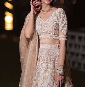 Peach And Off-white Lehnga Choli
