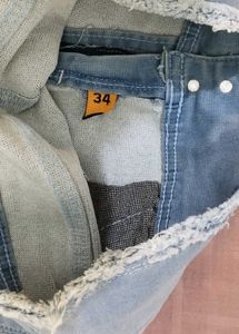 Ripped Light Wash Denim Jeans