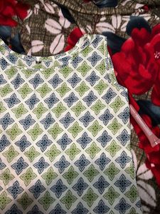 both Patterned Sleeveless Top and long kurti