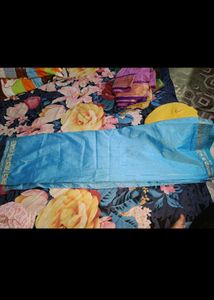 Woman Silk saree with stitched blouse