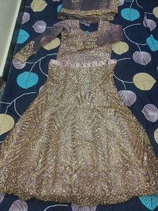 lehenga with small pipes like beads.