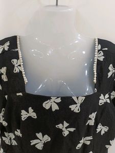 Georgette Frock With Pearls On The Neck