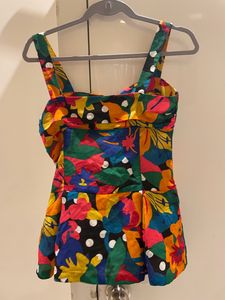 CUTE PEPLUM TOP IN S/M