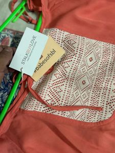 brand new Coral Flutter Sleeve Top