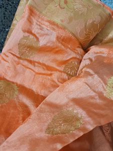 Elegant Orange Saree with Gold Accents