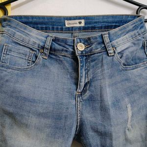 Ripped Knee Denim Jeans