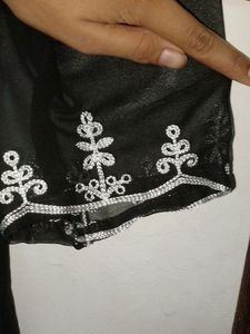 A Short Chikankari Kurti In Black Colour