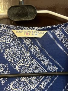 Blue Ethnic Shrug