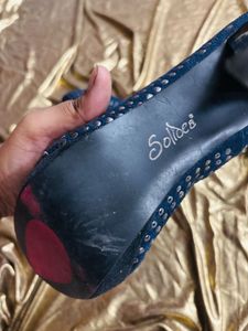 Blue studded heels