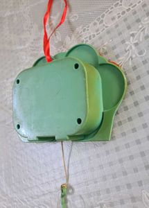 Musical Toy with a pull string