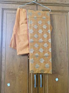 Pink Embroidered And Golden Chudidhar Set