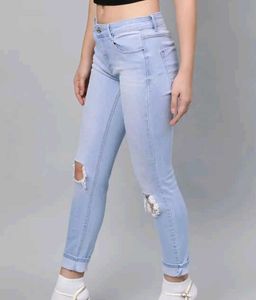 Women Blue Skinny Fit Mid-Rise Slash Knee Stretcha