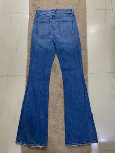 Flared Denim Jeans with patch pockets