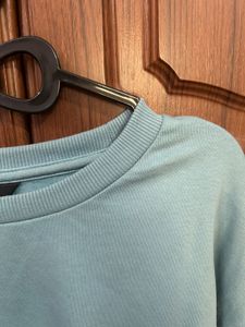 Light Blue Cropped Sweatshirt