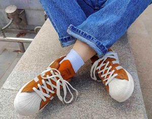 Adidas Superstar: Brown Suede Sneakers