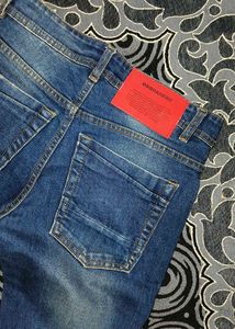Distressed Denim Jeans