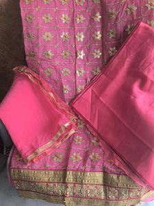 Pink Embroidered unstitched suit piece.