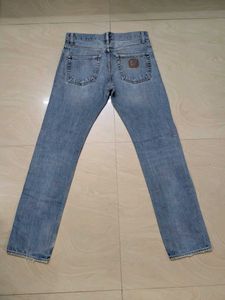 Worn Blue Denim Jeans
