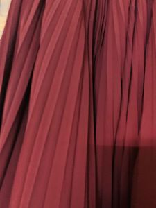 Pleated Maroon full skirt.